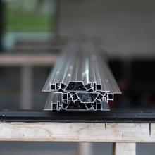 Nieuwe generatie aluminium draagstructuren voor brandveilige, energie-efficiënte gevels